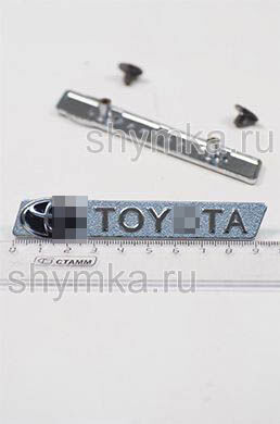 Шильд фигурный для автоковриков
TOY...TA + 2 болтика