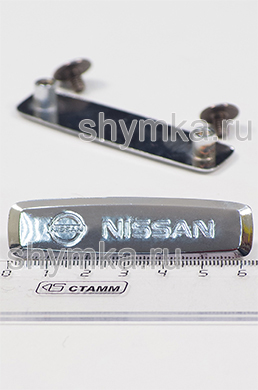 Шильдик металлический ГЛЯНЦЕВЫЙ 
для автоковриков NISSAN + 2 болтика
